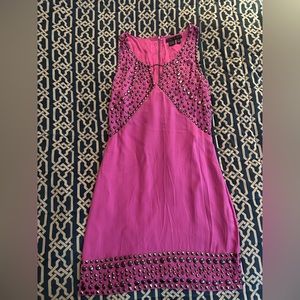 Bright pink silk dress with metal details